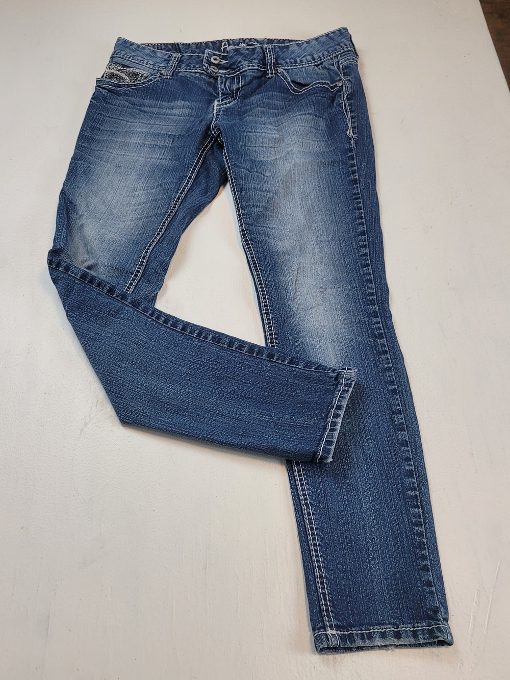 Amethyst low rise bootcut jeans in size 9
